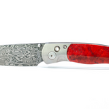 'El Rey' Button Lock Damasteel Pocket Knife With Red Coral Handle
