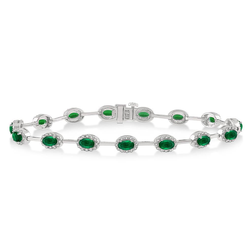 An oval emerald and diamond bracelet.