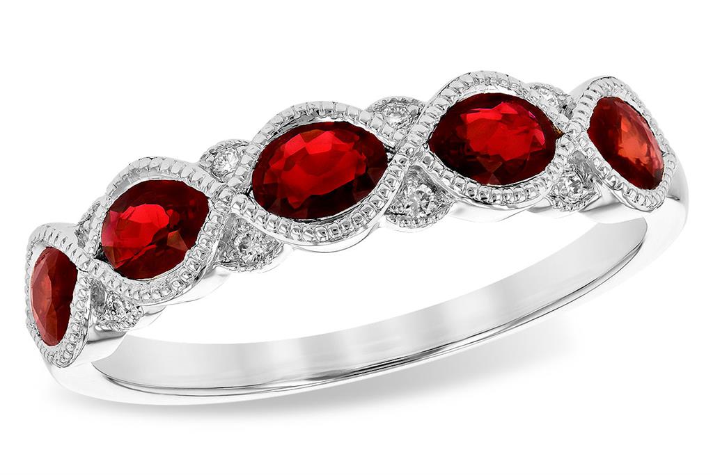 A ring with red stones and diamonds.