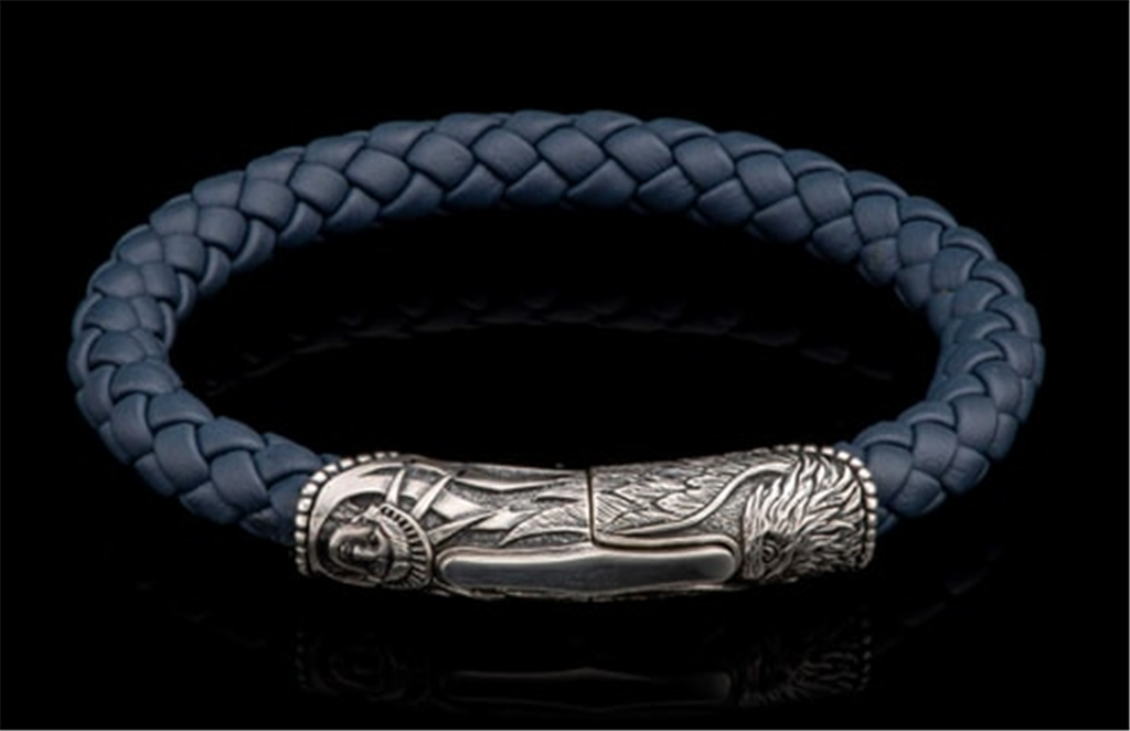 A blue leather bracelet with a silver clasp.