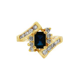 JT ESTATE 14K Yellow Gold Emerald Cut Sapphire Bypass Ring