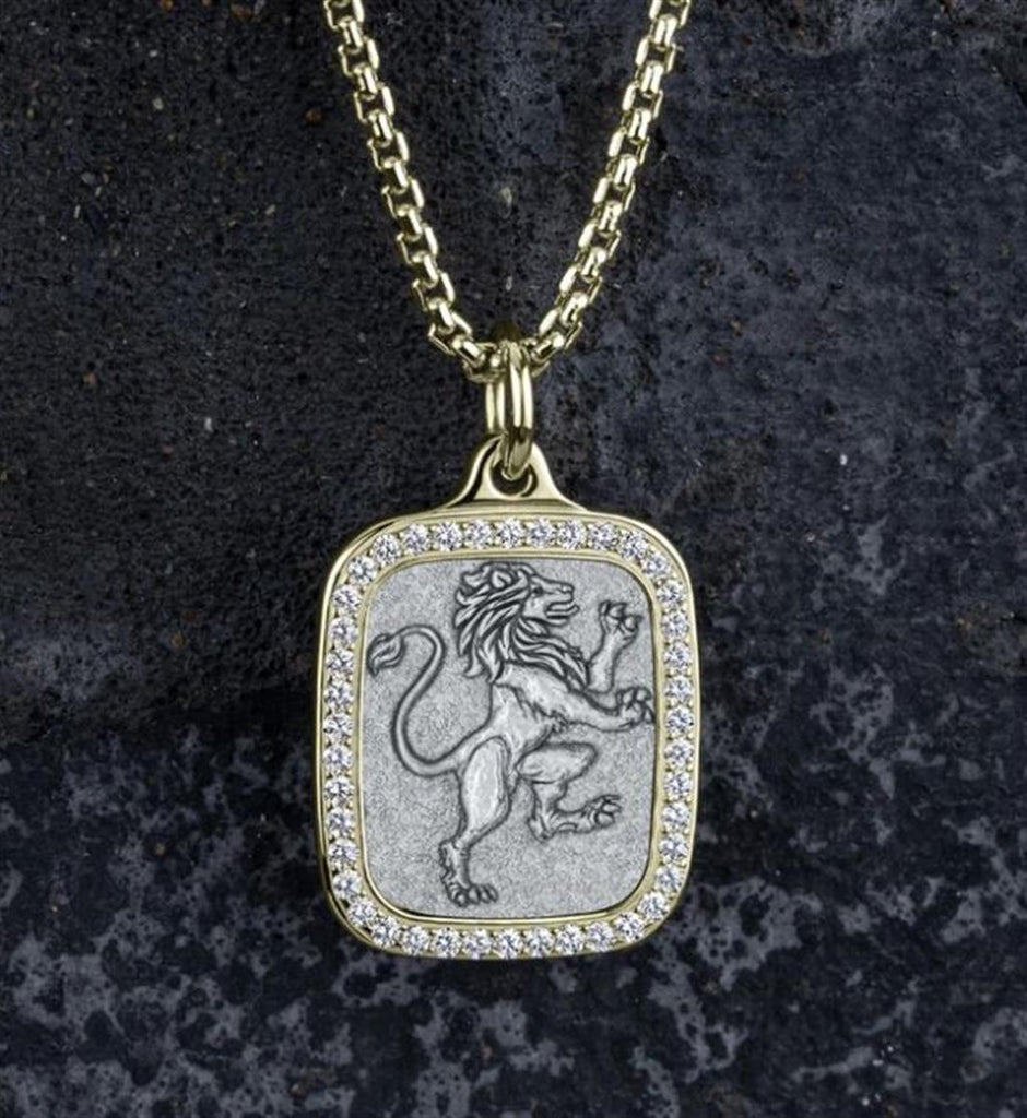 A gold lion pendant with diamonds on a black background.