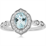 14K White Gold Oval Aquamarine And Diamond Halo Ring