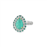 Platinum And 18K Yellow Gold Paraiba And Diamond Halo Ring