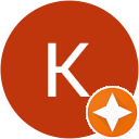 An orange circle with the letter k on it.